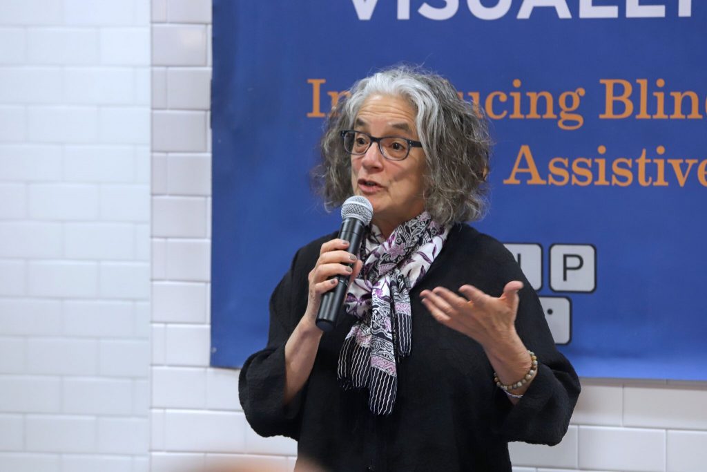 Lainey Feingold presenting at an event
